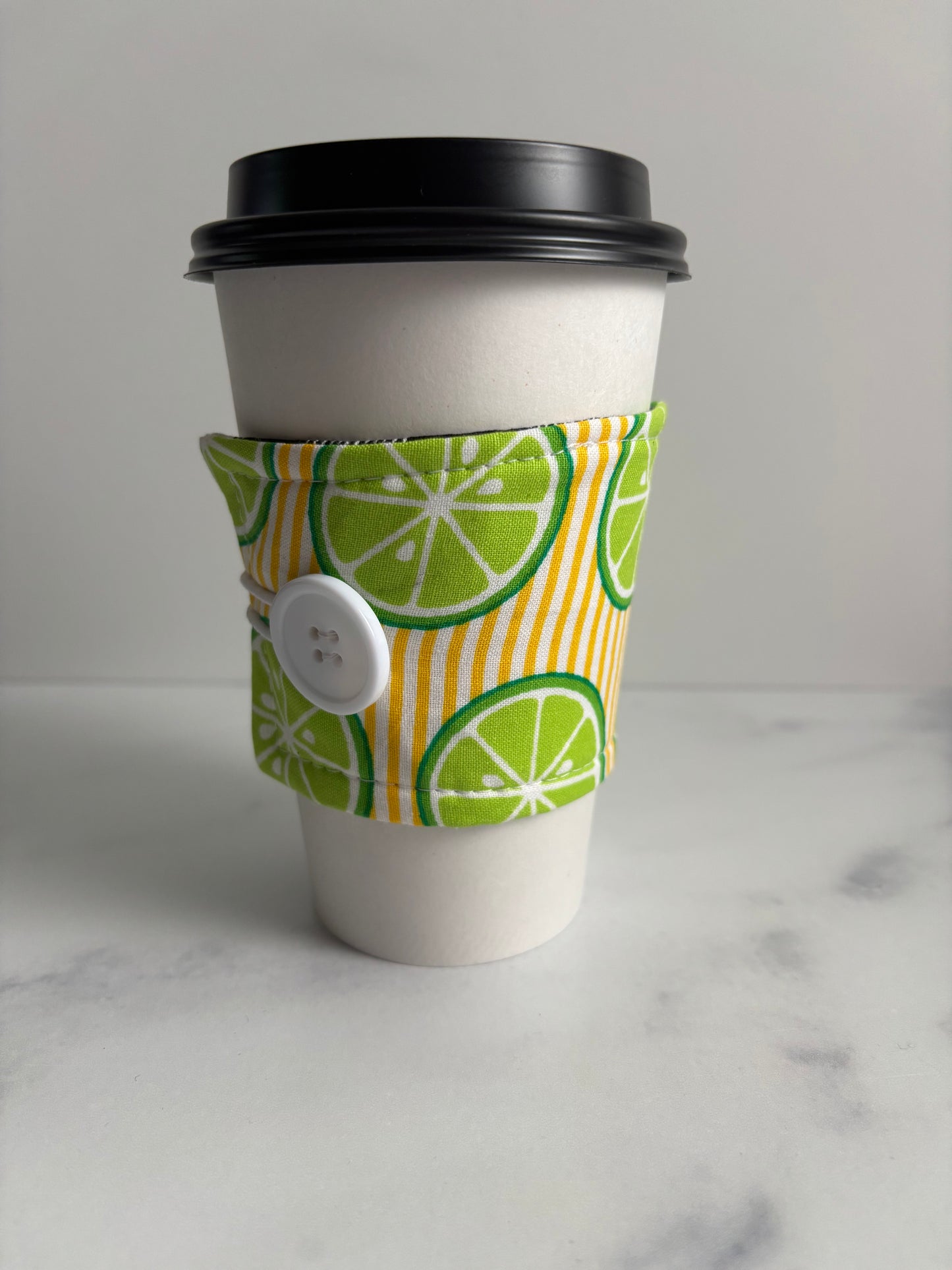 Limes on Yellow Stripes - Reusable Coffee Sleeve