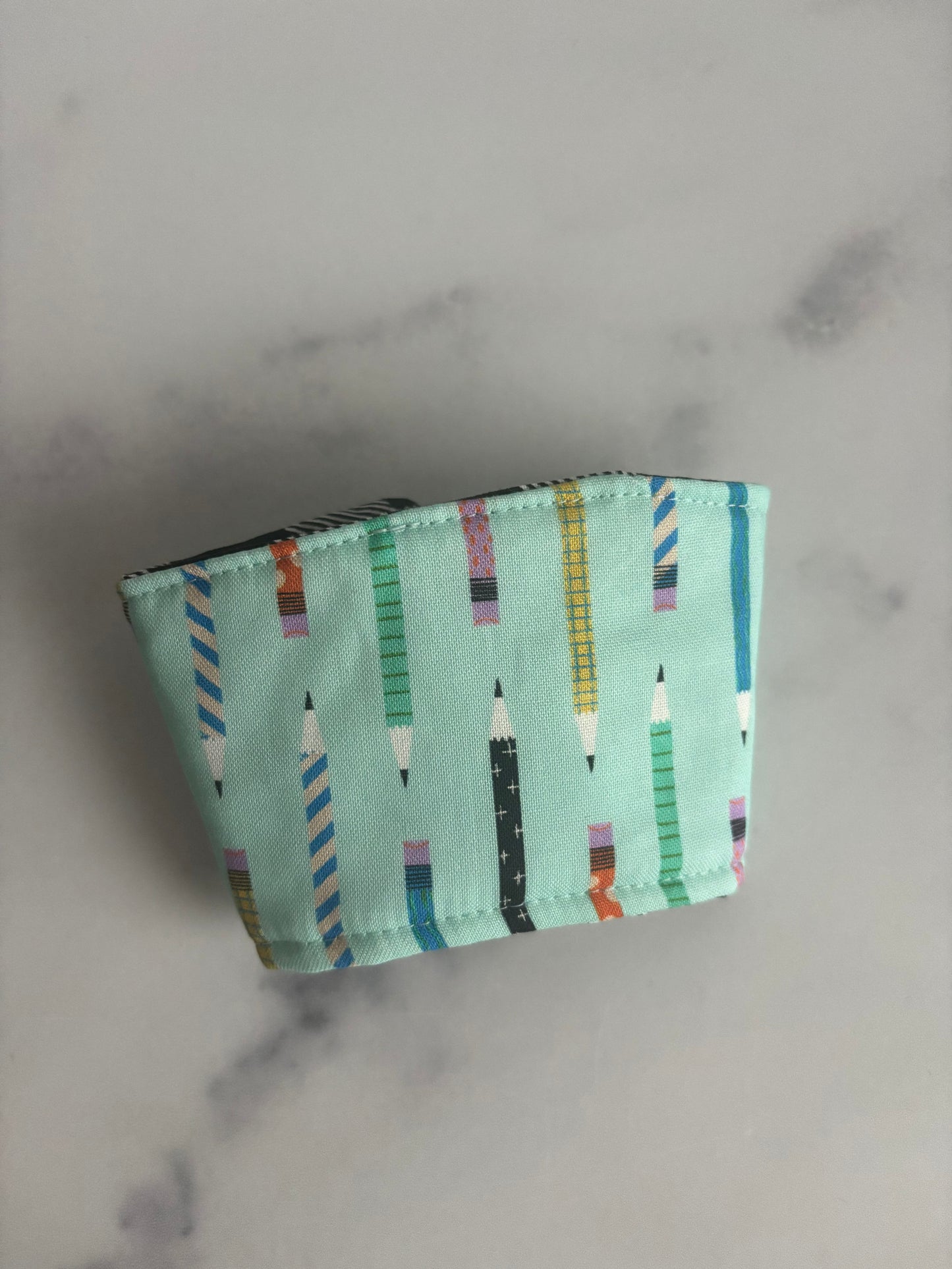 The Pencil Thief - Reusable Coffee Sleeve