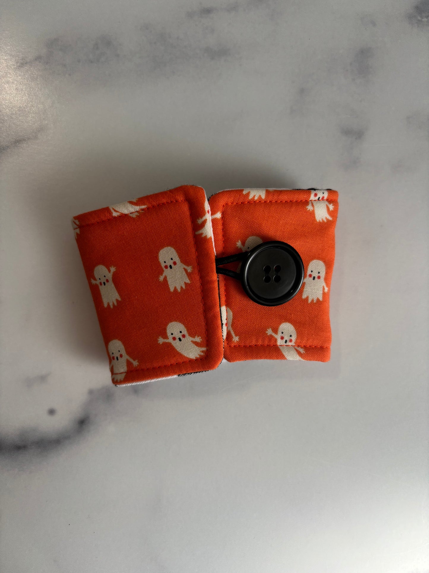 Ghosts on Orange - Reusable Coffee Sleeve