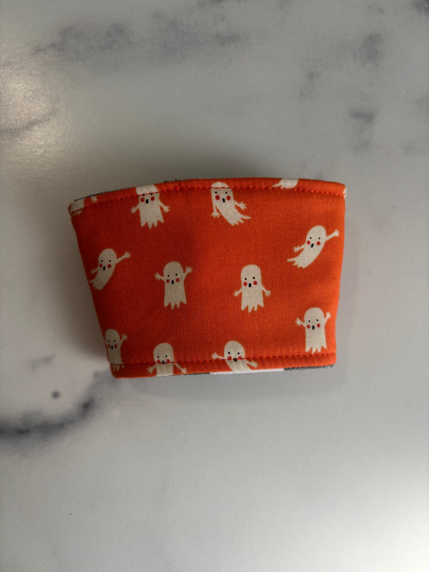 Ghosts on Orange - Reusable Coffee Sleeve