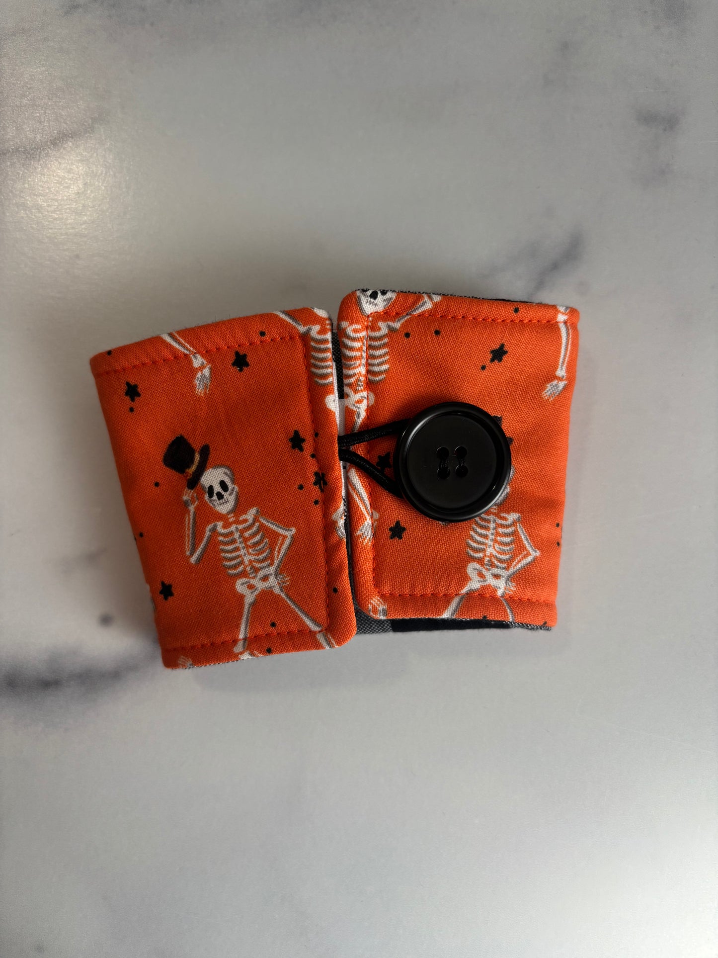 Dancing Skeletons on Orange - Reusable Coffee Sleeve