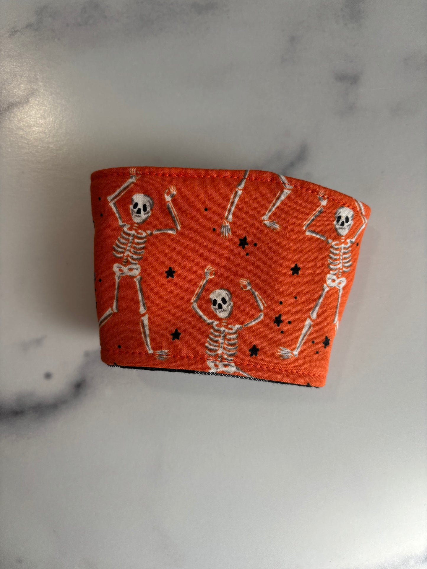 Dancing Skeletons on Orange - Reusable Coffee Sleeve