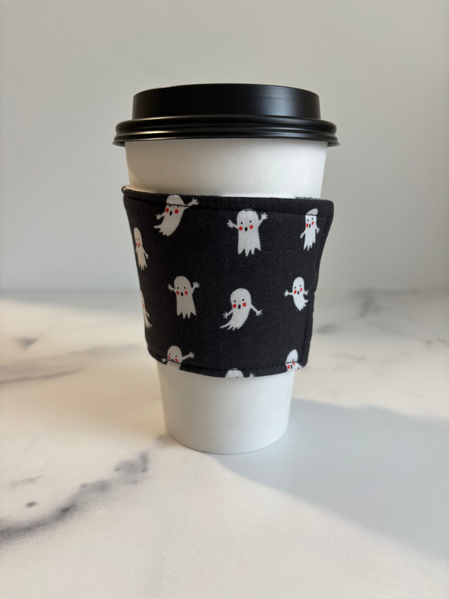 Ghosts on Black - Reusable Coffee Sleeve